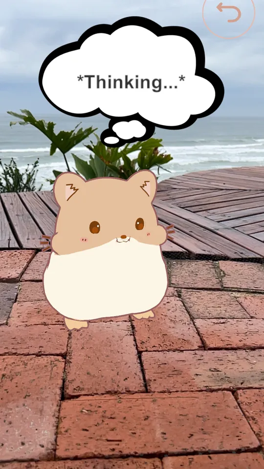 EMILY-GPT in AR: Emily stands on a brick path by the sea with a thought bubble that says Thinking…